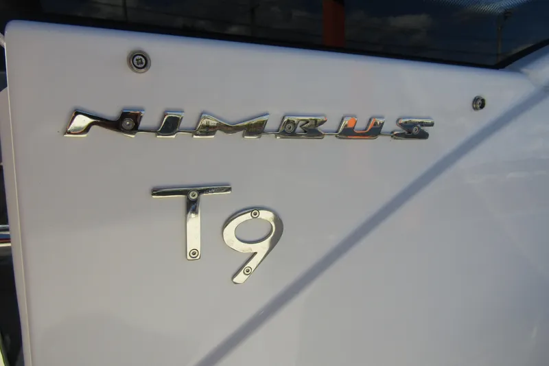 Slide: The Image of Close-up of 2025 Nimbus Tender 9 logo on white surface. - 39