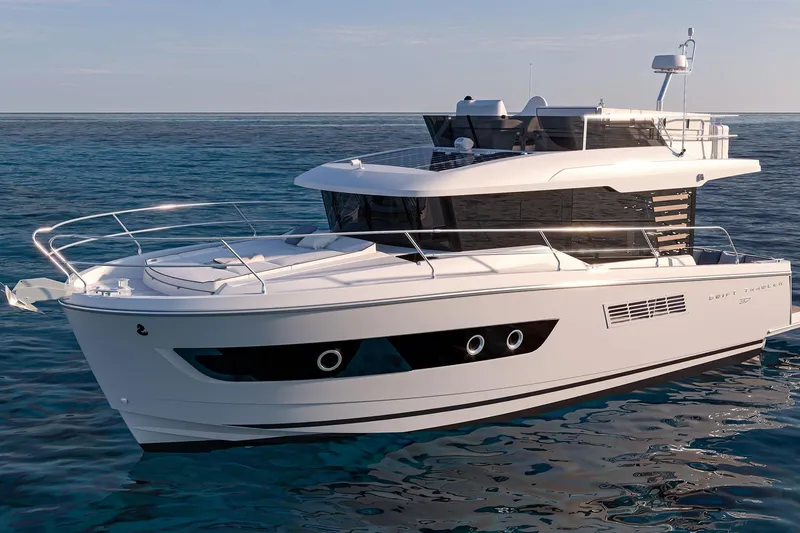 Slide: The Image of 2026 Beneteau Swift Trawler 37 FLY cruising on calm ocean waters. - 3