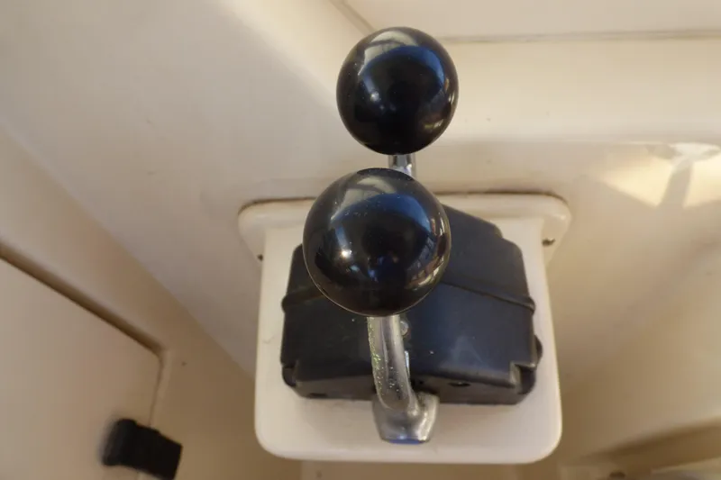 Slide: The Image of Throttle controls on a 2005 Mainship 34 Pilot Sedan Rum Runner II boat. - 22