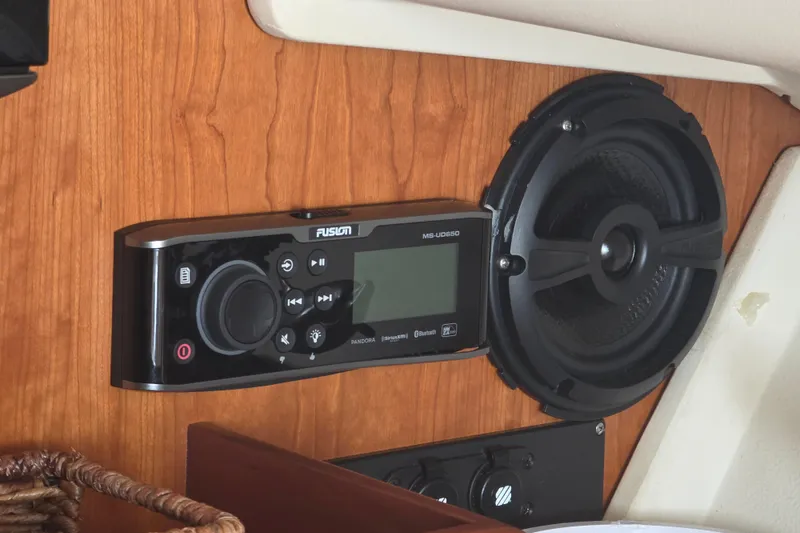 Slide: The Image of Fusion stereo system and speaker on 2005 Mainship 34 Pilot Sedan Rum Runner II. - 31