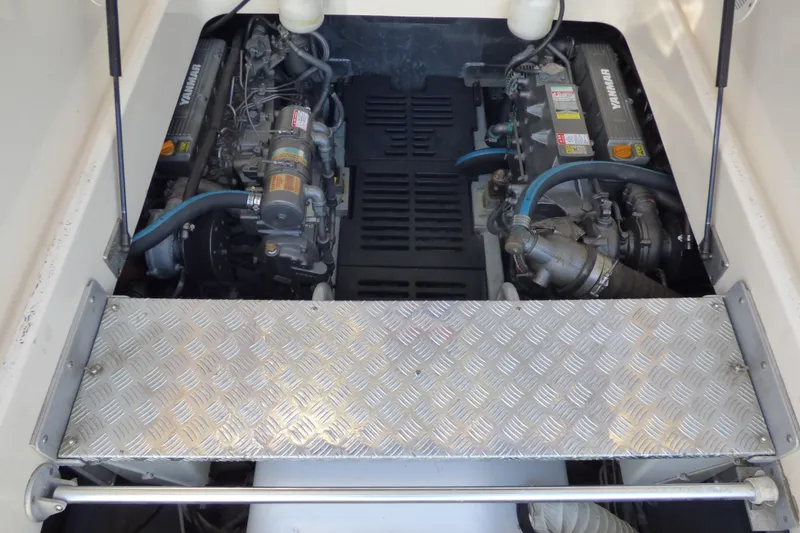 Slide: The Image of Engine compartment of 2005 Mainship 34 Pilot Sedan Rum Runner II with dual engines. - 41