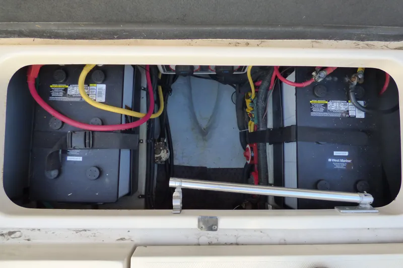 Slide: The Image of Battery compartment of 2005 Mainship 34 Pilot Sedan Rum Runner II with wiring. - 46