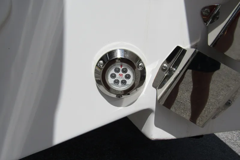 Slide: The Image of Close-up of a 2025 Nimbus Weekender 9 boat's underwater light fixture. - 11