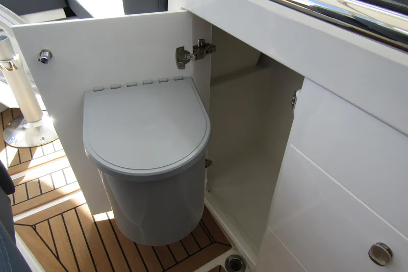 Slide: The Image of Open cabinet with trash bin on Nimbus Weekender 9, 2025 model. - 39