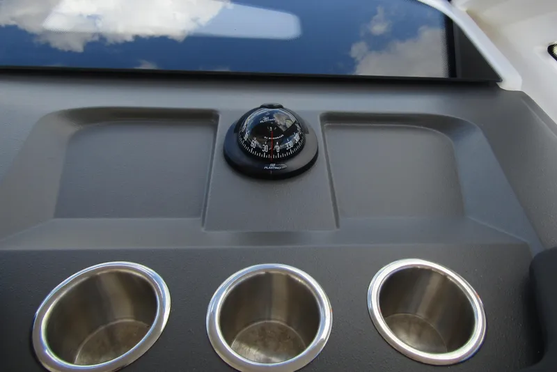 Slide: The Image of Dashboard of 2025 Nimbus Weekender 9 with compass and cup holders. - 17