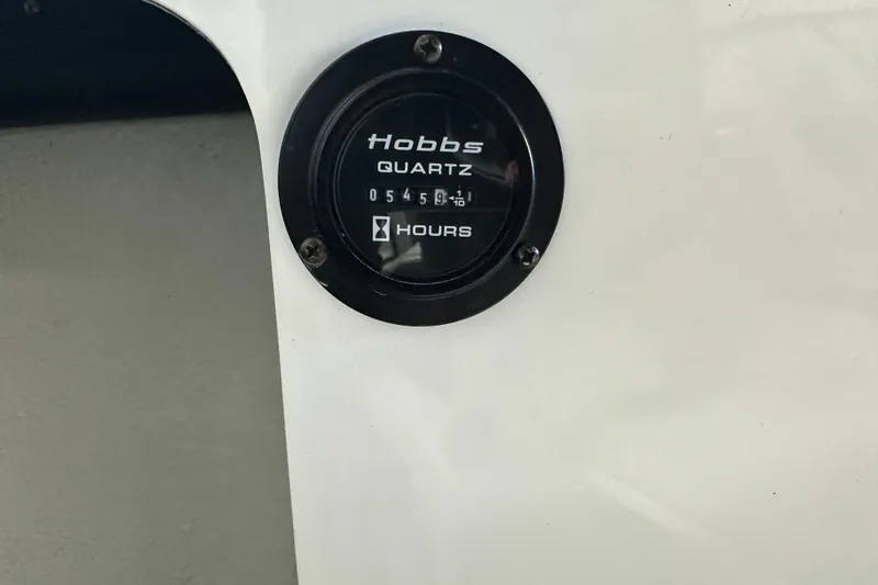 Slide: The Image of Hobbs hour meter on 2006 Cobalt 220 boat, displaying 545.8 hours. - 15