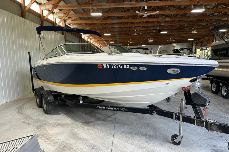 Slide: The Image of 2006 Cobalt 220 boat on trailer in indoor storage facility. - 4