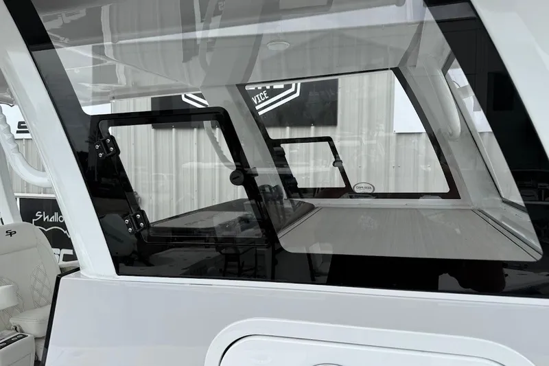 Slide: The Image of 2026 Sea Pro 322 Offshore boat interior with modern design and seating. - 27