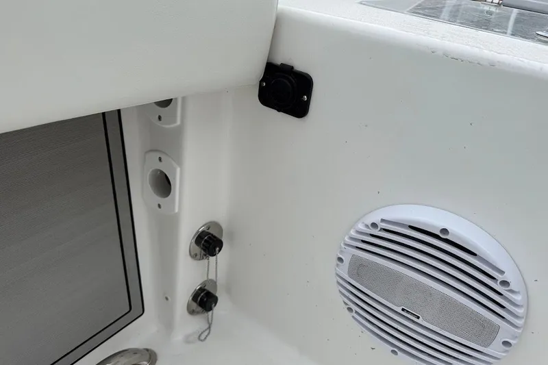 Slide: The Image of 2026 Sea Pro 322 Offshore boat interior with speaker and control panel. - 34