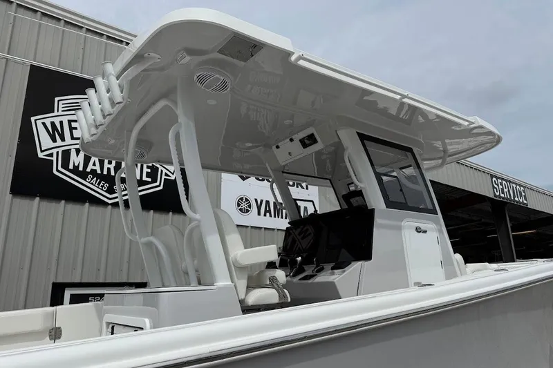 Slide: The Image of 2026 Sea Pro 322 Offshore boat at dealership, showcasing sleek design and modern features. - 7