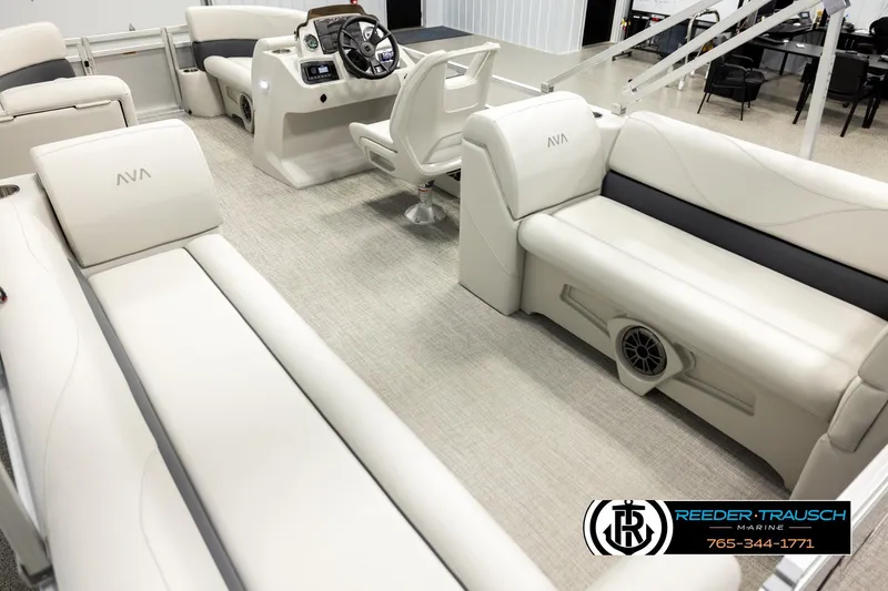 Slide: The Image of Luxurious interior of 2026 Avalon VLS QL pontoon boat with plush seating and modern helm. - 11