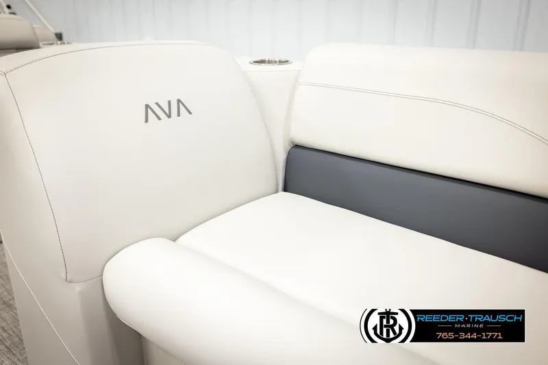 Slide: The Image of 2026 Avalon VLS QL boat seat with logo, featuring white and gray upholstery. - 37