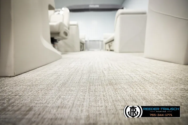 Slide: The Image of Luxurious interior of 2026 Avalon VLS QL boat with plush seating and carpet flooring. - 44