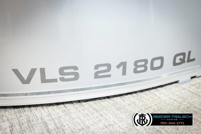 Slide: The Image of 2026 Avalon VLS QL boat model with Reeder-Trausch Marine branding. - 46
