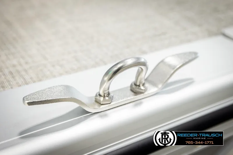 Slide: The Image of Close-up of a 2026 Avalon VLS QL boat cleat, featuring Reeder-Trausch Marine branding. - 48