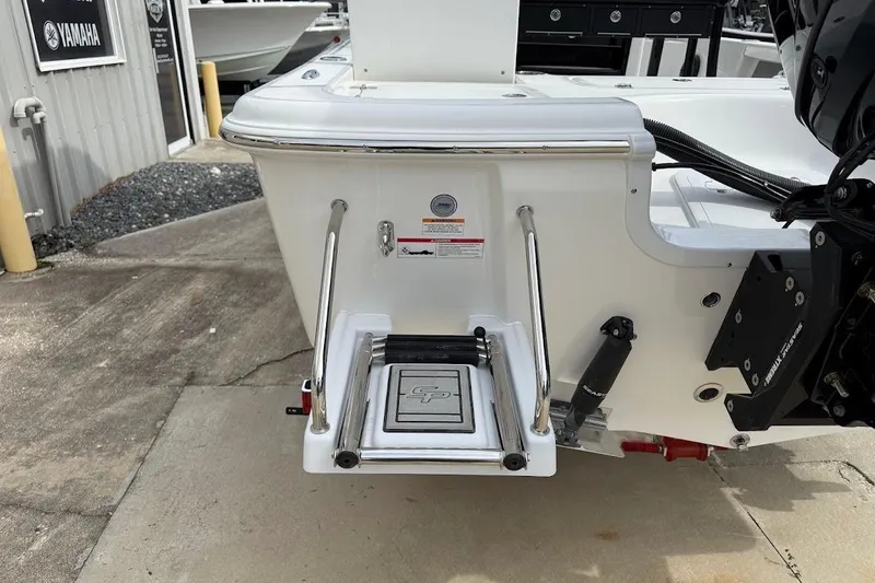 Slide: The Image of 2026 Sea Pro 230 Bay boat with rear swim platform and ladder. - 14