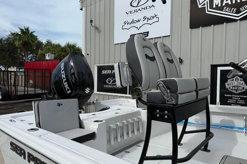 Slide: The Image of 2026 Sea Pro 230 Bay boat with Suzuki engine, featuring dual seats and modern design. - 6