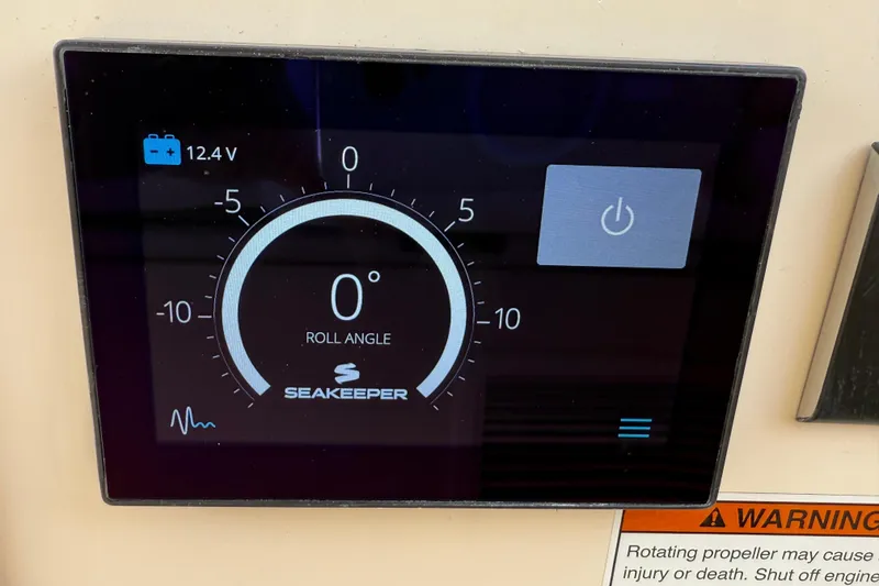 Slide: The Image of Seakeeper control panel on 2023 Grady-White Freedom 335 boat, displaying roll angle. - 10
