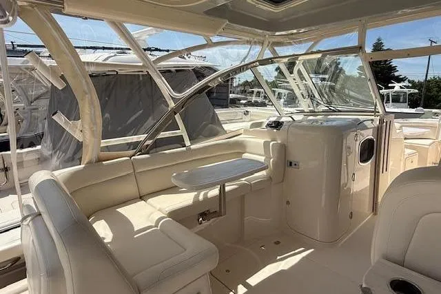 Slide: The Image of 2023 Grady-White Freedom 335 boat interior with luxurious seating and sleek design. - 3