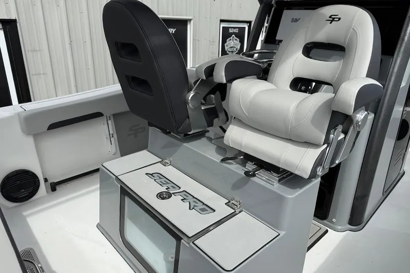 Slide: The Image of 2026 Sea Pro 245 Sandbar boat interior with comfortable seating and storage. - 17