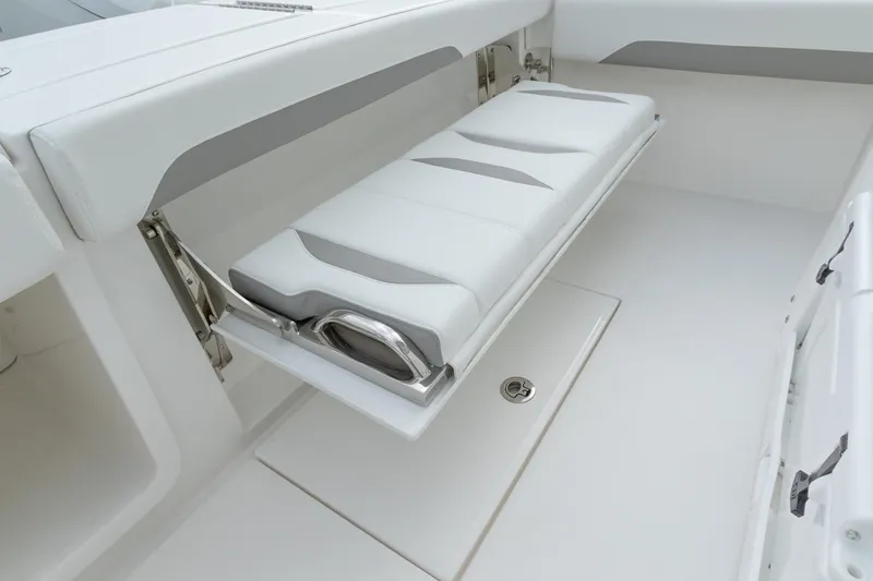 Slide: The Image of 2026 Regulator 28 boat dashboard with compass and speaker detail. - 10