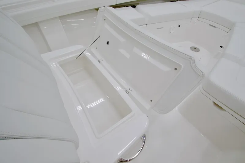 Slide: The Image of 2026 Regulator 28 boat interior storage compartment, open and spacious design. - 31