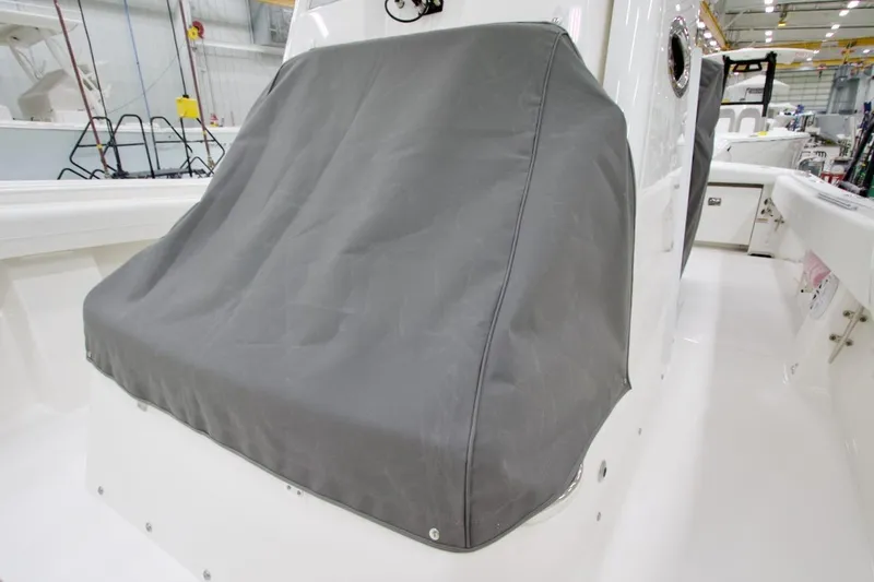 Slide: The Image of Gray seat cover on 2026 Regulator 28 boat, showcasing sleek design and protection. - 34