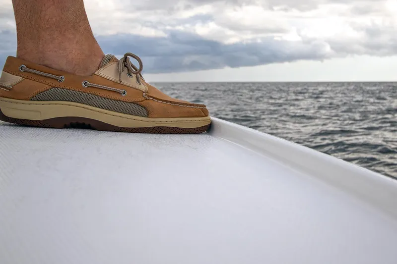 Slide: The Image of 2026 Regulator 28 boat cockpit with modern steering and control panel. - 7