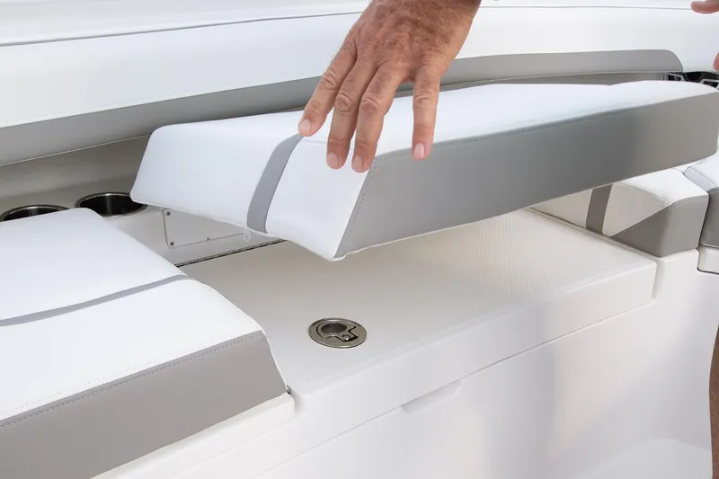 Slide: The Image of 2026 Regulator 28 boat console with storage compartment and electronic controls. - 9