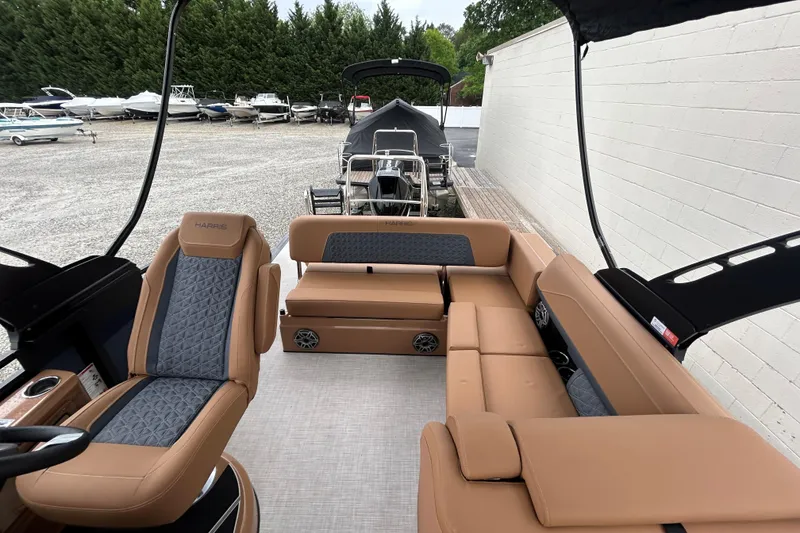 Slide: The Image of 2026 Harris FloteBote Solstice 250 SL interior with luxurious tan seating and modern design. - 10