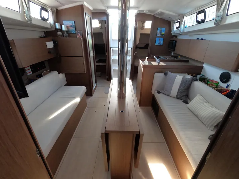 Slide: The Image of Interior of 2021 Beneteau Oceanis 38.1 yacht, featuring modern design and comfortable seating. - 15