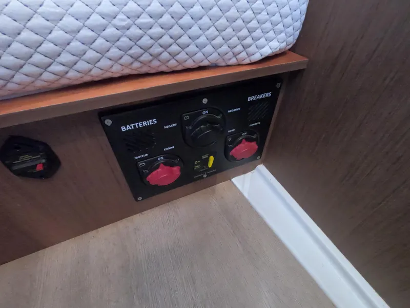 Slide: The Image of Battery control panel on a 2021 Beneteau Oceanis 38.1 yacht interior. - 22