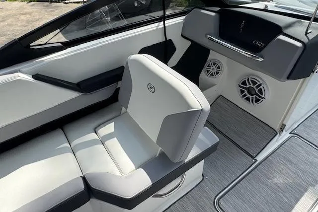 Slide: The Image of 2026 Cobalt CS23 boat interior with gray seating and modern design elements. - 16