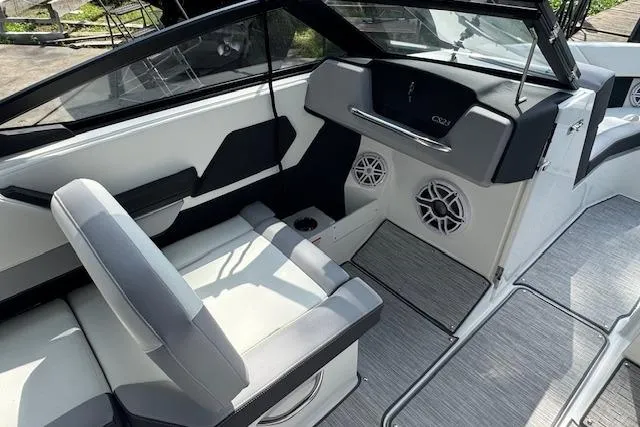 Slide: The Image of Interior of 2026 Cobalt CS23 boat with modern seating and audio system. - 17