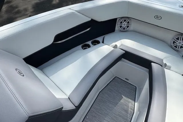 Slide: The Image of 2026 Cobalt CS23 boat interior with sleek white and gray seating and modern design. - 20