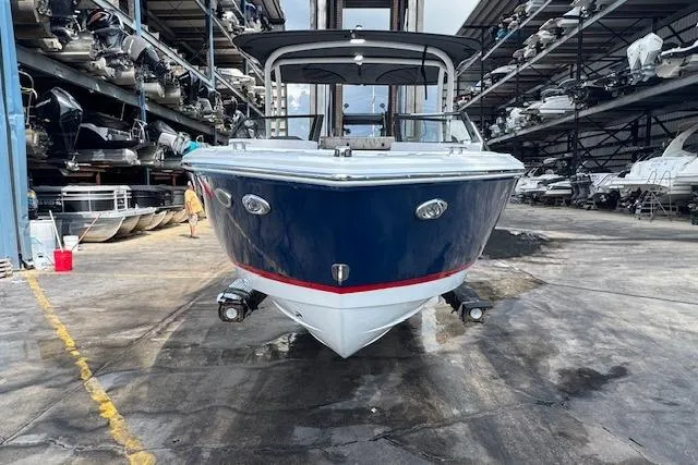 Slide: The Image of 2026 Cobalt CS23 boat in storage facility, front view. - 6