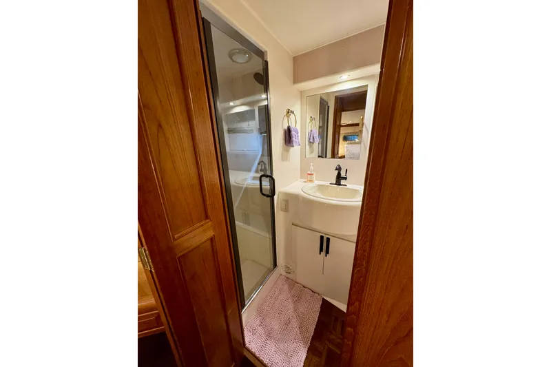 Slide: The Image of Bathroom interior of 1995 Ocean Alexander 486 yacht with shower and sink. - 42