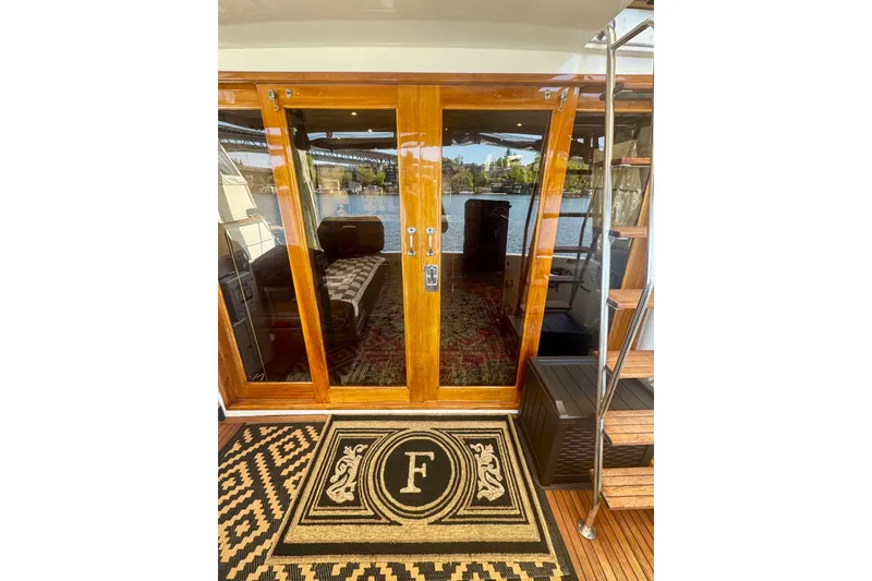 Slide: The Image of Luxury yacht Ocean Alexander 486, 1995 model, with elegant wooden doors and custom mat. - 46