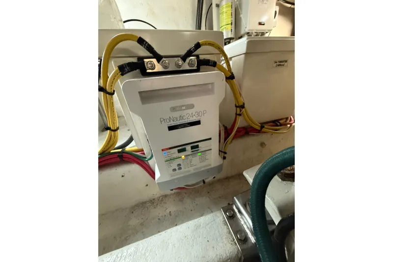 Slide: The Image of Battery charger in 1995 Ocean Alexander 486 yacht engine room. - 62