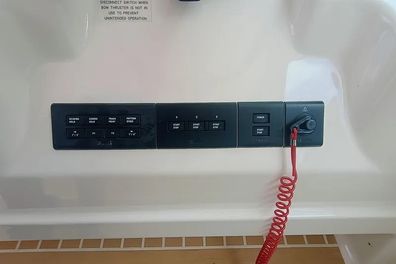 Slide: The Image of Control panel of 2021 Grady-White Freedom 375 boat with Yamaha controls. - 26