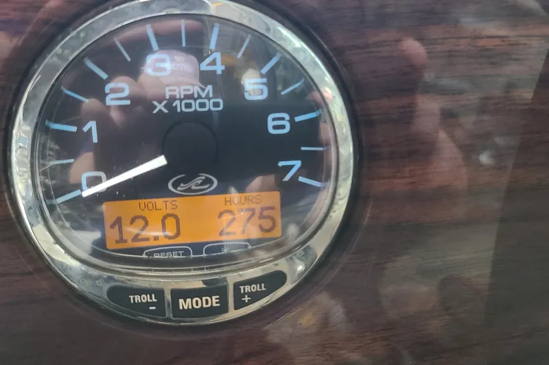 Slide: The Image of Close-up of 2008 Sea Ray 260 Sundeck tachometer showing 12 volts and 275 hours. - 15