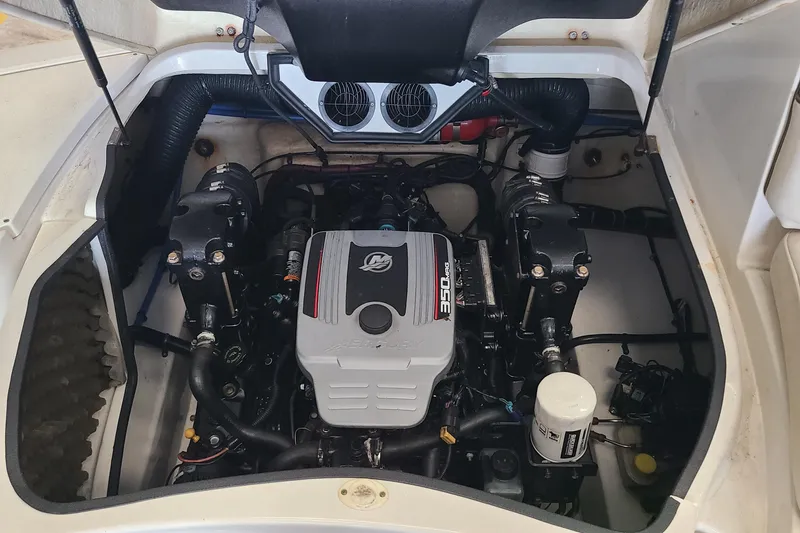 Slide: The Image of Engine compartment of a 2008 Sea Ray 260 Sundeck boat, featuring a 350 MAG engine. - 23