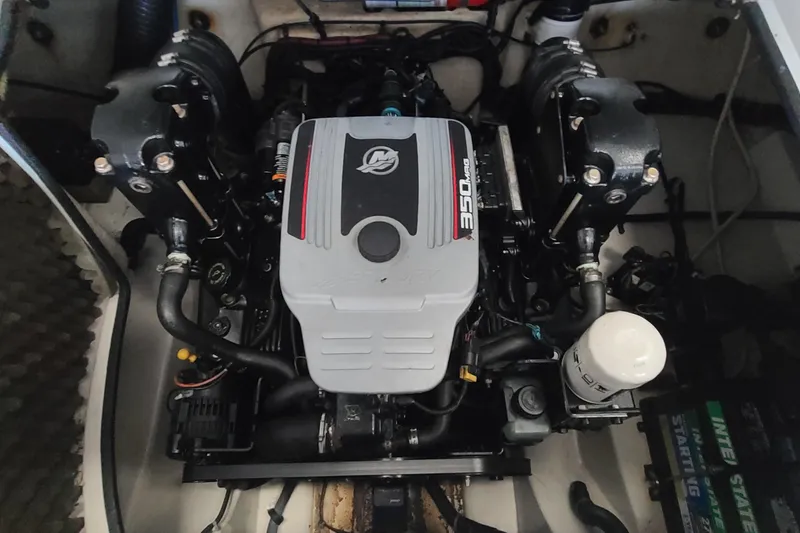 Slide: The Image of Engine compartment of a 2008 Sea Ray 260 Sundeck boat, featuring a 350 MAG engine. - 24