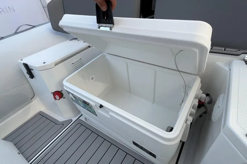 Slide: The Image of Open storage compartment on Northstar VEGA 5.4 boat, showcasing interior space, 2026 model. - 13