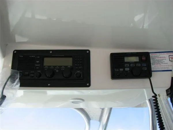 Slide: The Image of Control panel of a 2001 Cabo 35 Express boat with communication devices. - 23