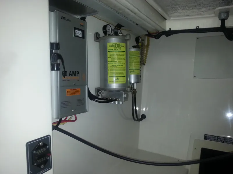 Slide: The Image of Electrical and filtration system inside a 2001 Cabo 35 Express boat. - 26