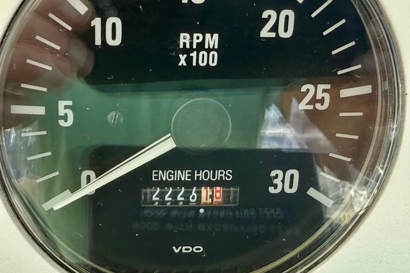 Slide: The Image of Close-up of a 2001 Cabo 35 Express tachometer showing 2226 engine hours. - 44