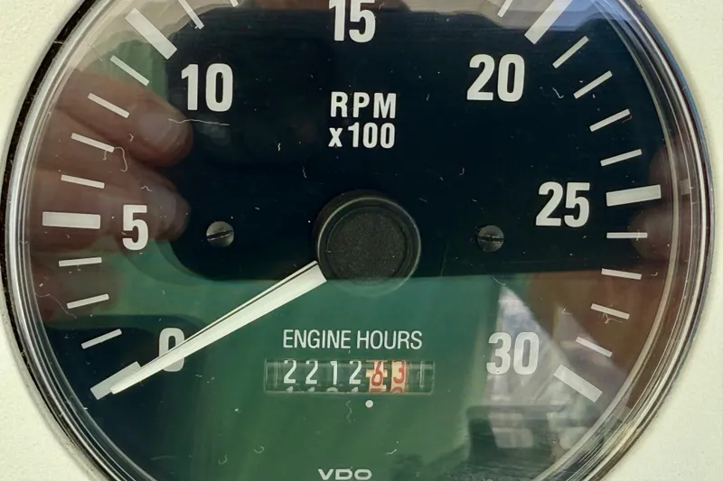 Slide: The Image of Close-up of a 2001 Cabo 35 Express tachometer showing 2212.3 engine hours. - 45