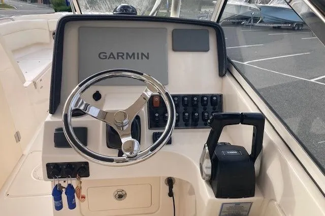 Slide: The Image of Control panel of 2022 Grady-White Freedom 275 boat with Garmin navigation system. - 8