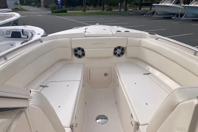Slide: The Image of 2022 Grady-White Freedom 275 boat interior with spacious seating and storage compartments. - 9